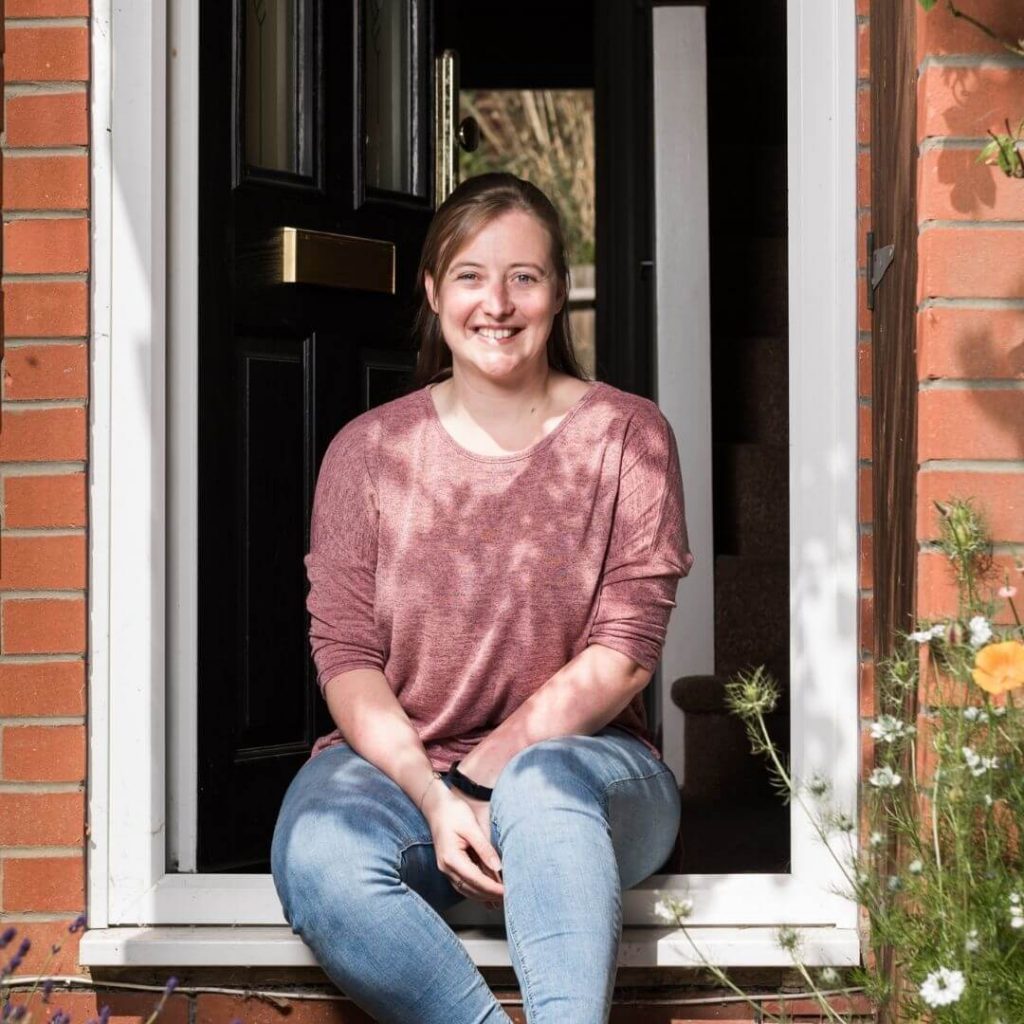 Jacky sitting on the doorstep