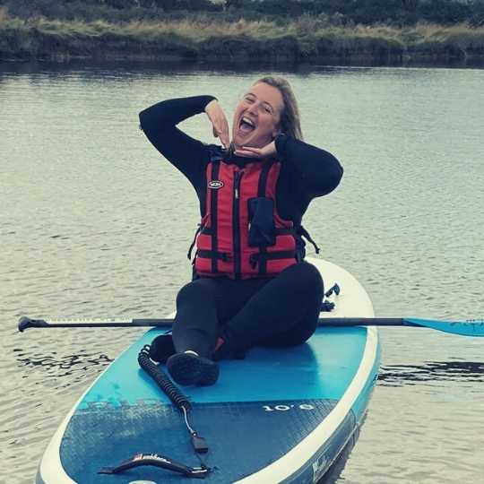 Jacky living her best life, going paddle boarding